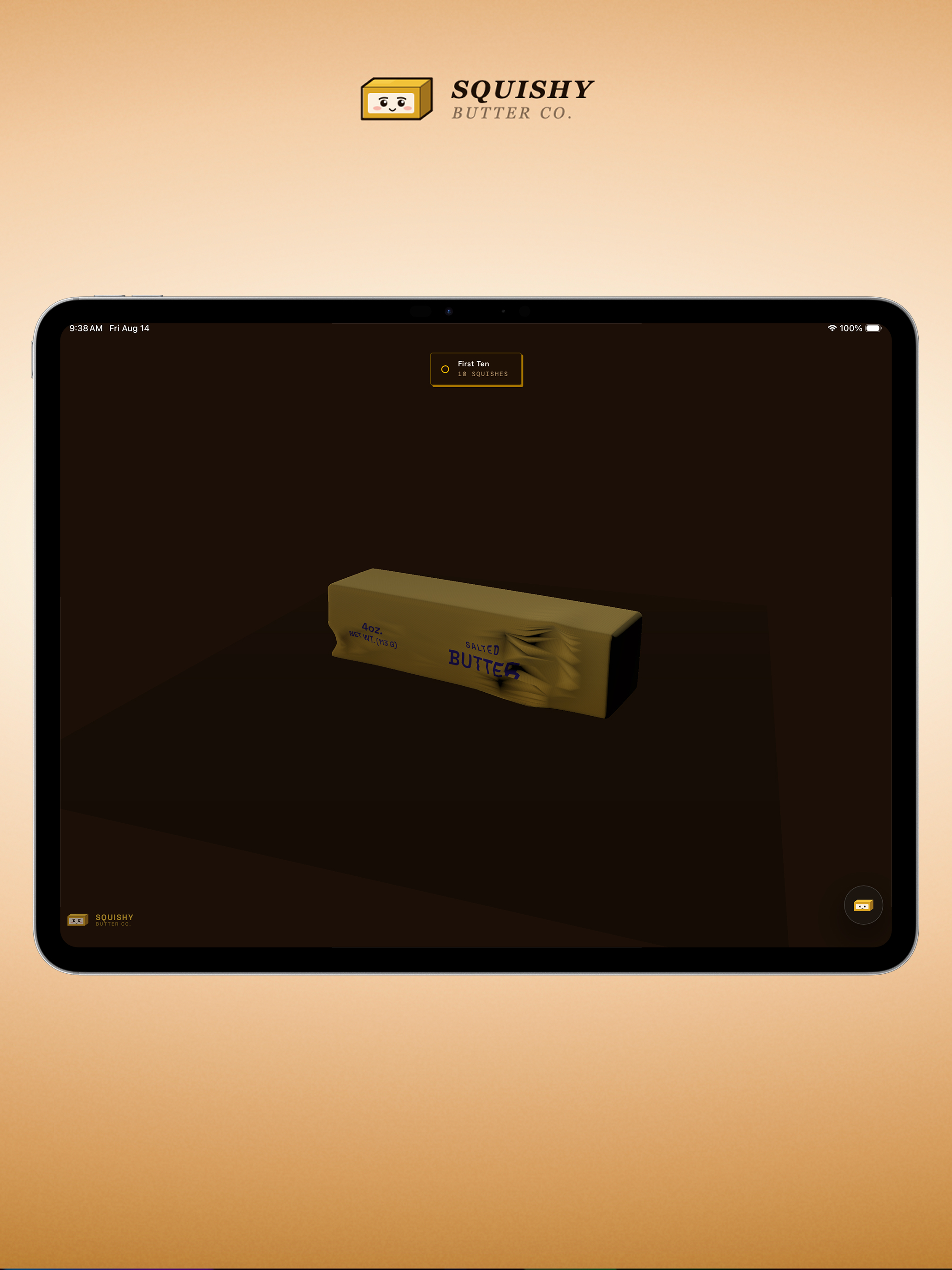 Squishy Butter on iPad - butter dented mid-squish with First Ten achievement badge